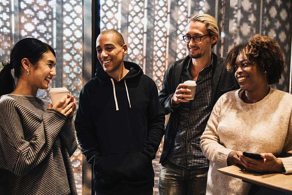 People in break room smiling